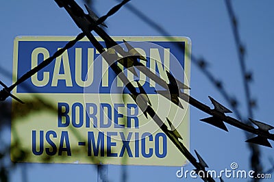 Barbed wire and border between USA and Mexico Stock Photo