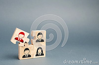 One of the puzzles is disconnected from the overall structure. puzzle with an incompetent and toxic Dismissal of employees, search Stock Photo