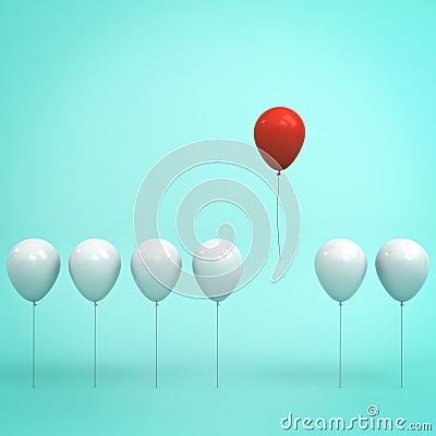 One red balloon flying in the air away from other white balloons Stock Photo