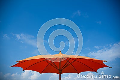 One of Red umbrella in blue sky Stock Photo