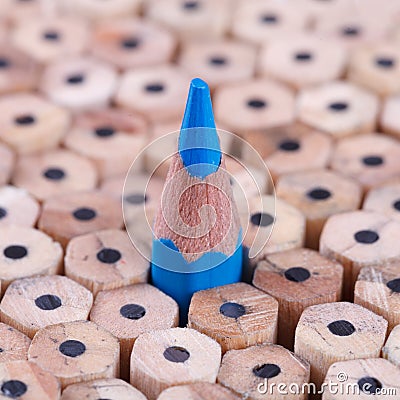 One sharpened blue pencil among many ones Stock Photo