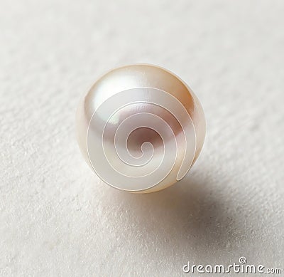 One shiny nacreous white pearl isolated on white background Stock Photo