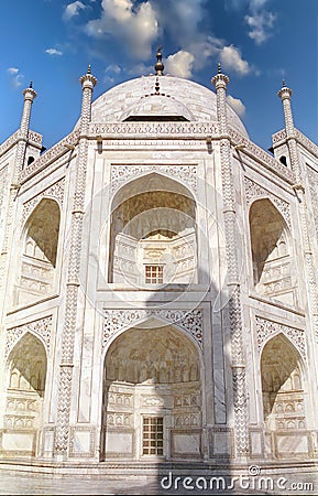 One side of Taj Mahal with the beautiful symmetric arched openings Stock Photo