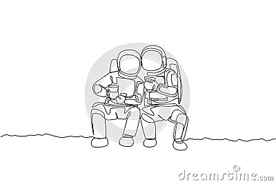 One single line drawing two young happy astronauts sitting while drinking coffee together in moon surface graphic vector Vector Illustration