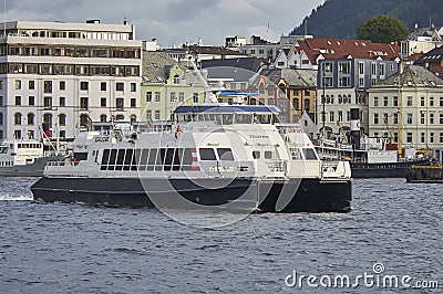 One of the small Coastal Passenger Ferries, The Teisten, makes its way out of Bergen. Editorial Stock Photo