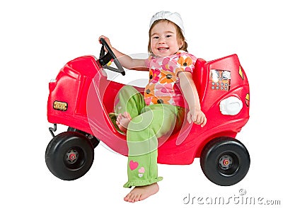 One small little girl playing with toy car. Stock Photo
