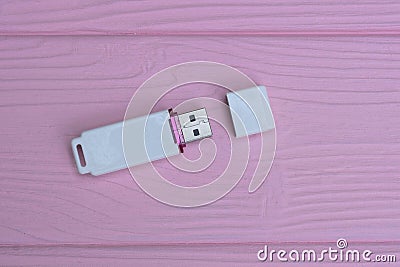 one small white plastic closed mobile flash drive Stock Photo