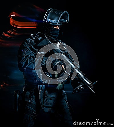 One soldier police swat tactical forces man black backg Stock Photo