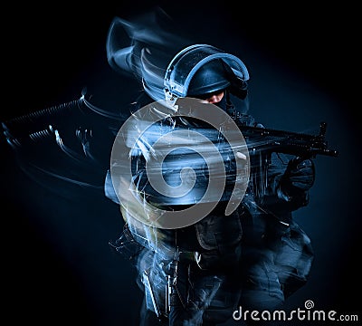 One soldier police swat tactical forces man black backg Stock Photo