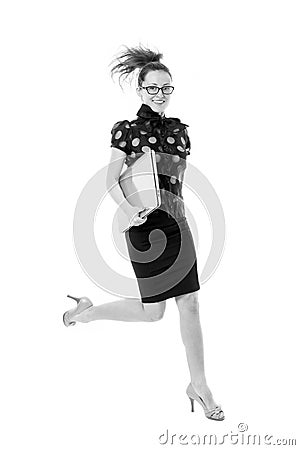 One step ahead. Hurry up. Inspiring innovations. Business lady inspired feel powerful. Girl inspired hold laptop jump Stock Photo