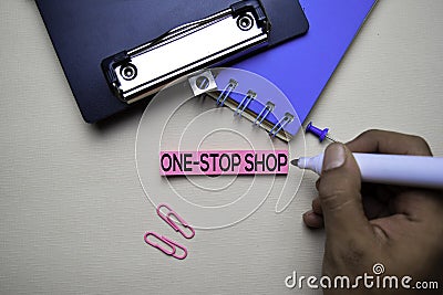 One - Stop Shop text on sticky notes with office desk concept Stock Photo