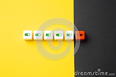 One of the switches is off. The enabled switch button among disabled ones. Stock Photo