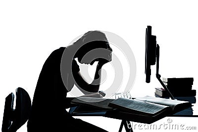 One teenager silhouette studying with computer Stock Photo