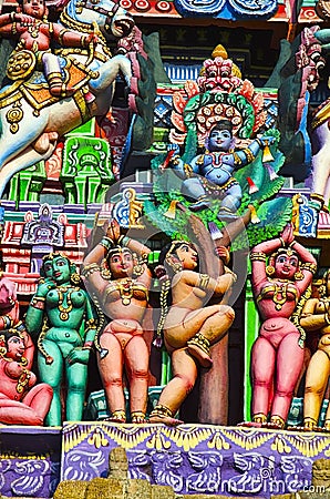 Colorful idols on the Gopuram, Sarangapani Temple, Kumbakonam, Tamil Nadu, India. Stock Photo