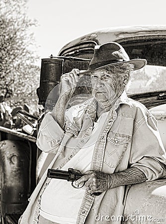 One tough old lady with a gun Stock Photo