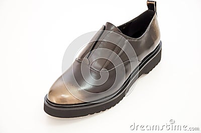 One trandy women boot in brown colour on white. Stock Photo