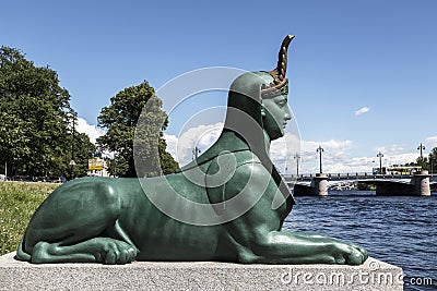One of the two green sphinxes cast in 1826 at the pier on the Malaya Nevka River, close-up. St. Petersburg, Stock Photo