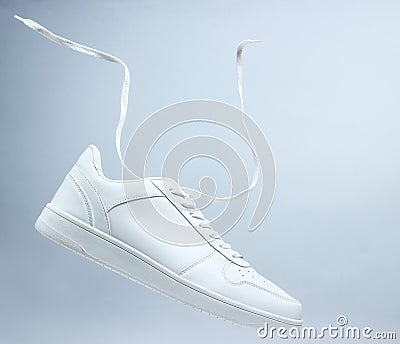 One white unisex sneaker Stock Photo