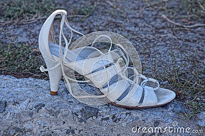 one white womens leather high heel sandal Stock Photo