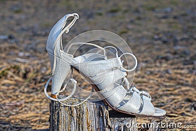 one white womens leather high heel sandal Stock Photo