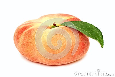 One whole flat peach with green leaf (isolated) Stock Photo