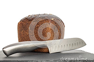 Fresh baked dark bread on white Stock Photo