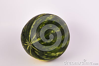 One whole sweet organic watermelon on solid white background Stock Photo