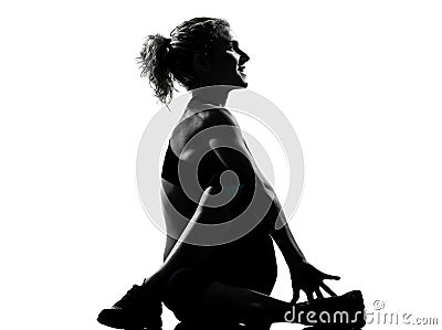 Woman warming up yoga stretching rotation fitness posture Stock Photo