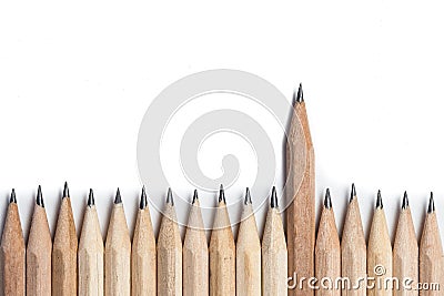 One wood pencil standing out from the row Stock Photo