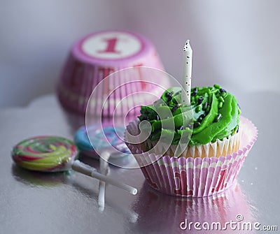 One-year hapy birthday cupcake and lollipops Stock Photo