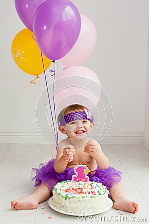 One year old birthday girl with cake Stock Photo