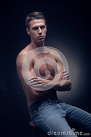 One young adult man, Caucasian, fitness model, muscular body, sh Stock Photo