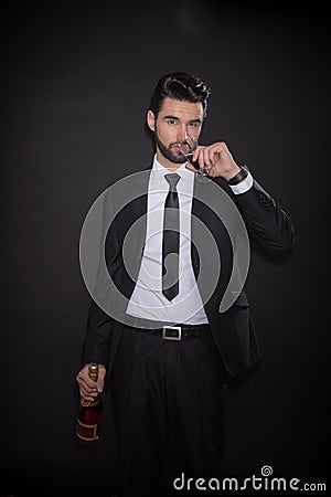 One young man drinking glass alcohol wine bottle Stock Photo