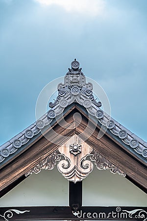 Onigawara (Ogre Tile) and Gegyo roof ornaments at Shogan-ji temple. Kyoto, Japan. Stock Photo