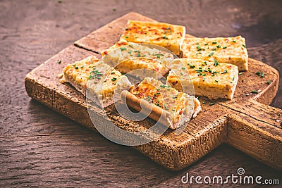 Onion cake Zwiebelkuchen - homemade, savory German onion cake or pie of steamed onions and bacon Stock Photo