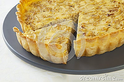 Onion Quiche with Slice Cut Out Stock Photo