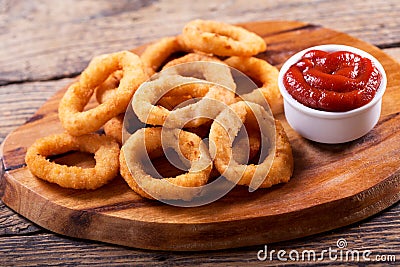 Onion rings with ketchup Stock Photo