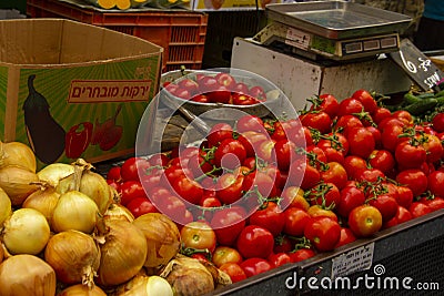 Onions and tomatoes in an open market Editorial Stock Photo