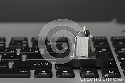 Online conference concept-miniature speaker Stock Photo