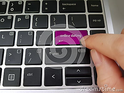 Online Dating concept using keyboard enter key Stock Photo