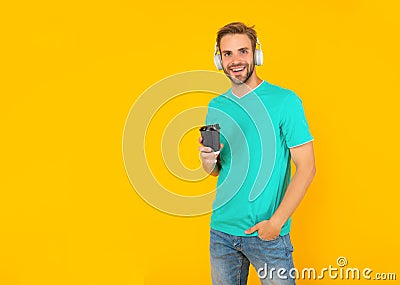 online education. back to school. young guy in headphones drink coffee. music lover. Stock Photo