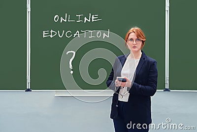 Online education with a question mark, problems with learning new technologies and the Internet, copy space. Concept of trouble Stock Photo