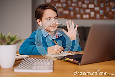 Online learning, boy using laptop for his classes Stock Photo