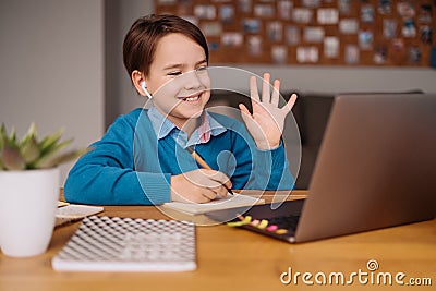 Online learning, boy using laptop for his classes Stock Photo