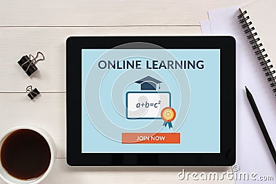 Online learning concept on tablet screen with office objects Stock Photo