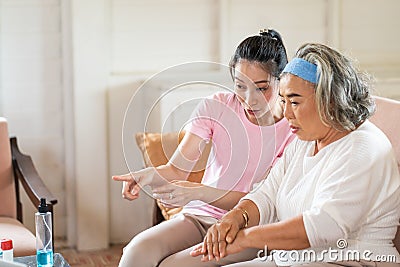 Online Learning how to prevent the coronavirus from laptop computer. Young Asian caregiver teach correct hand cleaning by Stock Photo