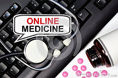 Online medicine. Information label on the keyboard . Stock Photo