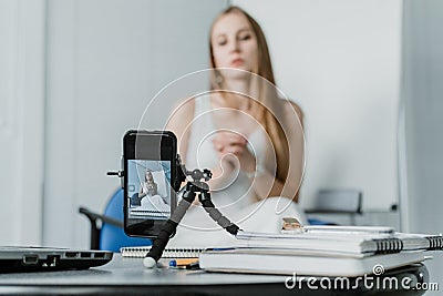 Online meetings, remote teamwork discussing, virtual meeting. Business woman talking to her colleagues in video conference. Stock Photo