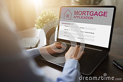 Online mortgage application on screen. Property loan. Business and financial concept. Stock Photo