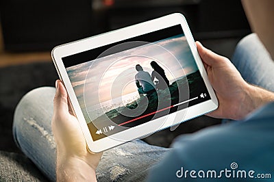 Online movie stream with mobile device. Stock Photo